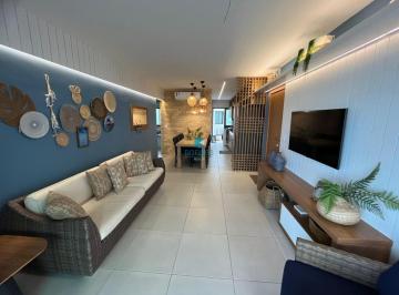 Foto 01 · Apartamento pé na areia à venda em Itacimirim com 107m², 3 quartos e garden