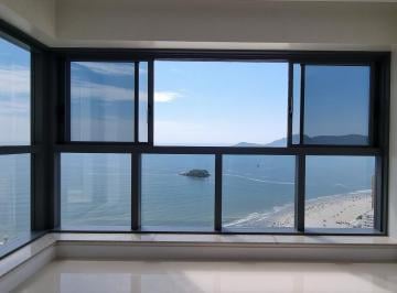 Ambiente com janela de canto para o mar aberto e a Ilha das Cabras · 4 suítes, vista mar e sol da manhã no New York em Balneário Camboriú