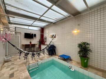 Casa · 134m² · 3 Quartos · 1 Vaga · Casa sobreposta baixa com Dormitórios, Suíte, Piscina, Churrasqueira e Quintal na Vila Belmiro – San