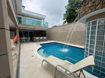e3d0344283b1154d5d82ae973da56989c3906426 · Casa com 7 suites à venda, 430 m² por R$ 2.480.000 - Jardim Virgínia - Guarujá/SP