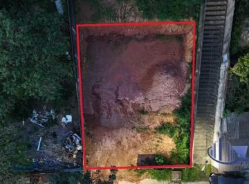 Foto 01 · Terreno à venda em Guarapari-ES: lote murado de 312,60 m² no bairro São Judas Tadeu, rua asfaltada!