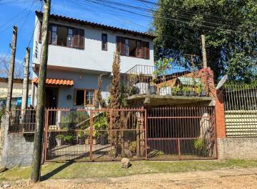 Casa · 112m² · 4 Quartos · 1 Vaga · CASA COM 4 DORMITÓRIOS, VAGA DE GARAGEM COBERTA,PÁTIO E VARANDA NO BAIRRO TARUMÃ/VIAMÃO