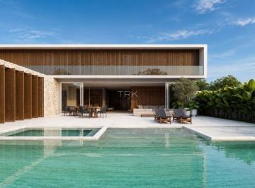 Casa · 1700m² · 6 Quartos · 15 Vagas · Tudo em grandes proporções. Menos o ego.