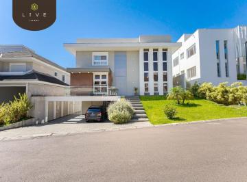 Casa · 429m² · 4 Quartos · 2 Vagas · Casa de alto padrão, mobiliada, com 3 suítes, 4 vagas de garagem e elevador em condomínio no Ecovill