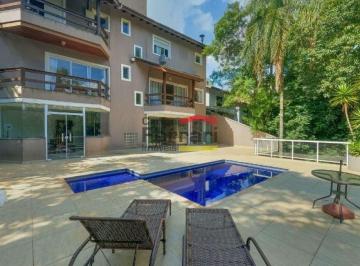 Casa · 340m² · Casa com 4 Suítes, Piscina Aquecida e Espaço Gourmet | Serra da Cantareira