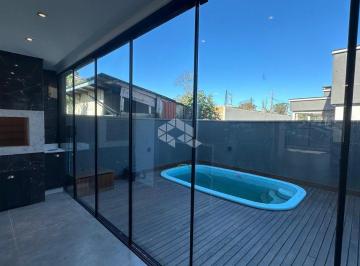 Photo 1 · Sobrado com 3 Suítes e piscina em Mariscal - Bombinhas/SC