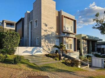 1164ccf2-8dcf-4a8c-8450-89184afb94f9 · Casa no condomínio Residencial Itahyê para venda com 4 quartos, sendo 4 suítes, 414m²
