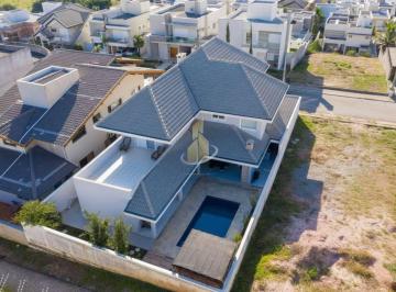 9ad3228d6651b5dee1e86fe0738da471cc808434 · Sobrado de Alto Padrão à Venda – Condomínio Jaguary | 4 Suítes, Piscina e Lazer Completo