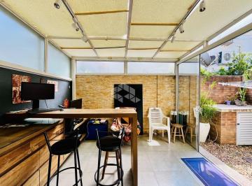 Photo 1 · Casa semimobiliada à venda de 3 dormitórios, suíte, churrasqueira, 2 vagas, cond