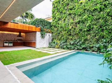Casa · 620m² · 3 Quartos · 4 Vagas · Casa Sobrado à venda no Jardim América com 3 quartos, 5 suítes e 4 vagas de garagem.