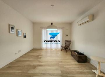 300aadaf54b95d4163ef3eca403385a728339af2 · Apartamento à venda na praia da Enseada no Guarujá I Omega Imoveis