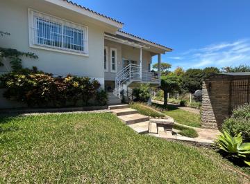 Photo 1 · Casa de 3 dormitórios com uma área de 660,58 m² de terreno no bairro Higienópolis.