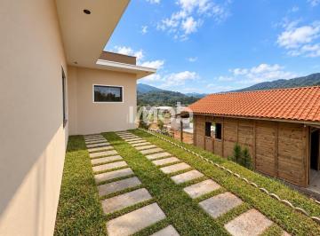 Terraço Moderno com Caminho de Pedras.png · CASA COM SUÍTE + 2 QUARTOS - JARAGUÁ 99