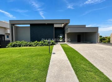 casa-moderna-com-fachada-geometrica-e-jardim-exuberante1791231406956.png · Casa à venda  3 suítes  6 vagas  piscina   Piscina  Cond. Village Ipanema 1  Araçoiaba da Serra, SP