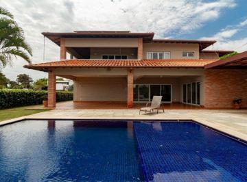 Casa de 4 quartos, Brasília · Lago Sul com 4 suítes, piscina aquecida, energia solar, área gourmet e quadra de vôlei de areia