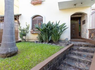 Photo 1 · Casa de condomínio, 3 dormitórios, 1 suíte, 1 vaga coberta, no bairro Cristal.