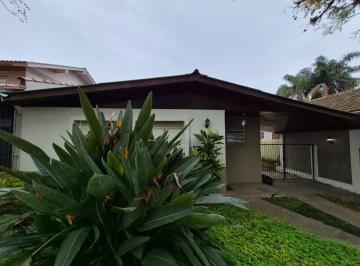 Photo 1 · Casa 3 Dormitórios à venda com Piscina na Rua Carumbé - Porto Alegre - RS
