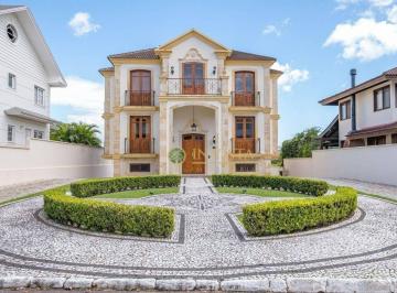 1ff1aa082652da42d4c418dd9c3315b7ba315128 · Casa em condomínio fechado no Cacupé, em Florianópolis.