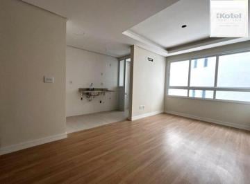 Living e cozinha · Apartamento à venda no Bom Fim – 1 suíte, vaga de garagem e excelente localizaçã