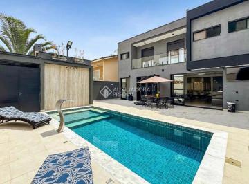 Casa · 440m² · 4 Quartos · 4 Vagas · Sobrado à venda em condomínio fechado com 440 metros quadrados, 4 suítes, 6 vagas, piscina privativa
