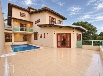 Piscina e fachada da casa de 4 dormitórios no condomínio Terras do Madeira, Fazendinha. · Casa em condomínio, Terras do Madeira, Fazendinha, 4 dormitórios, 2 suítes, pisc