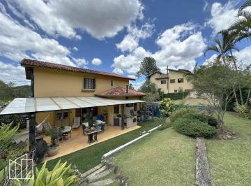 Fachada rústica e avarandada da casa, no Nova Higienópolis. · Casa rústica em condomínio, Nova Higienópolis, 2 lotes, 1.200 m², 3 dormitórios,