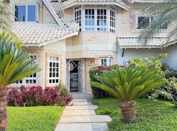 Casa · 560m² · 4 Quartos · Casa em Jurerê internacional 900m2 de terreno.