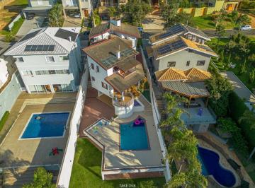 c245ef7a-0f96-47dc-9b12-30e5026e14ae · Casa no condomínio Green Boulevard para venda com 4 quartos, sendo 2 suítes, 417m²