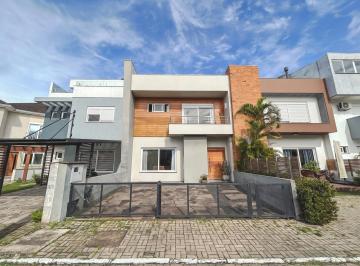 Photo 1 · Casa 3 dormitórios com 150m2 em condomínio com infraestrutura no bairro Hípica!
