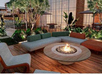 Fire place com sofás e jardim no pavimento de lazer do Art Tower (imagem ilustrativa) · Duas suítes e lavabo em andar alto do Art Tower Home Club, Itajaí