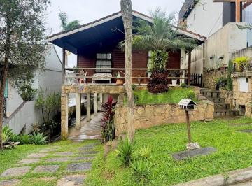 Casa · 220m² · 3 Quartos · 4 Vagas · Casa de madeira à venda no Condomínio Aruã