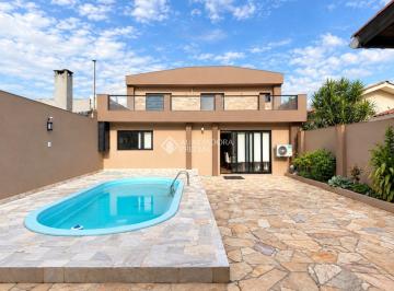 Casa · 250m² · 3 Quartos · 2 Vagas · Casa no bairro Jardim Botânico de 3 suítes e 2 vagas
