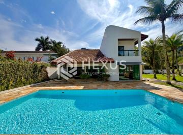 Foto · Casa reformada com varanda piscina e área gourmet no Acapulco, Guarujá