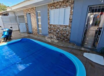 Photo 1 · Casa à venda com três quartos suíte e piscina na Tancredo Neves em Santa Maria RS