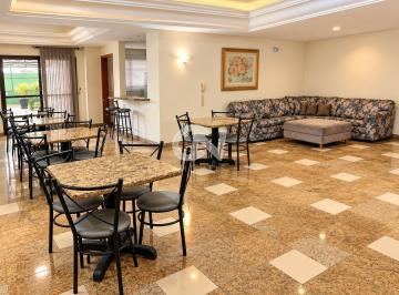 Salão moderno com lounge e cafeteria.png · Apartamento, 4 dormitórios, 2 vagas, Centro - Joinville