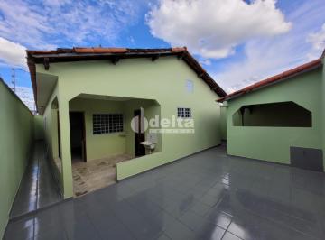 NULL · Casa com 3 suítes disponível para locação no bairro Laranjeiras em Uberlândia-MG