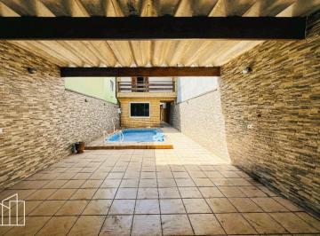 f0c0dcaf-c863-4861-9232-2594e1b8a5eb.jpeg · Casa (sobrado) de 186 m², Jardim São Jorge do Guapituba, varanda gourmet, depósi