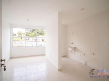 Living · Apartamento de 48.06m² no bairro Santa Cândida, com 2 quartos, 1 banheiro e 1 vaga de garagem