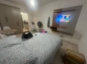 7f85647164dc39fc9f007c831121f6e74b696bc6 · Apartamento Sala Living para venda na Ponta da Praia Santos