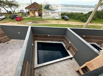lu30zr02ywq0zdaxmtyymtvl_md · sobrado em condomínio frente mar em Itanhaém