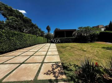 Foto 01 · Casa térrea para venda no Cond. Jardim Plaza Athénée com 342m² de área construída e 1000m² de área t
