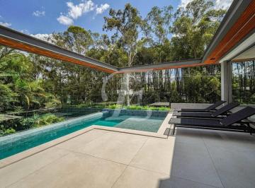 b779d35ede25cd67335baec357fe21e79bffded0 · Casa com 4 dormitórios para alugar, 650 m² por R$ 130.830,00/mês - Alphaville - Barueri/SP