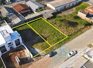 20230831185033739702.jpg · Terreno em rua pavimentada pronto para construir