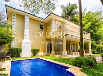 Foto 01 · Casa em condomínio com 4 suítes e piscina