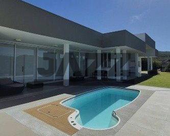 Casa · 400m² · 3 Quartos · 4 Vagas · Espetacular Residência Térrea Mobiliada para Venda e Aluguel no Condomínio Jardim das Palmeiras