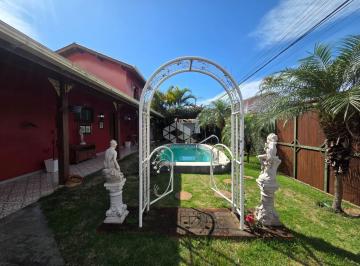 Photo 1 · CASA Á VENDA NO RIO TAVARES COM 3 QUARTOS SENDO 2 SUÍTES 3 VAGAS DE GARAGEM NO R