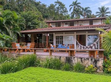 Casa · 362m² · 5 Quartos · 2 Vagas · Casa de Alto Padrão Mobiliada com 5 Quartos em Angra dos Reis – RJ