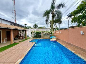 Foto · Casa reformada com varanda piscina e área gourmet em Jardim Virgínia, Guarujá