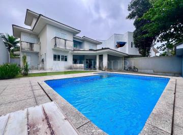 Casa · 240m² · 4 Quartos · 4 Vagas · Casa no Guarujá, Praia de Pernambuco, com Piscina, 4 Súites e 4 vagas de garagem.