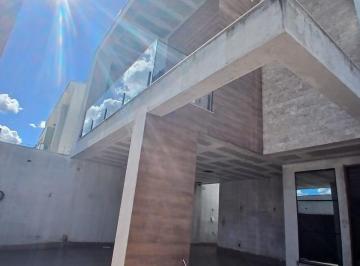 Photo 1 · Casa moderna com 4 dormitórios no bairro Ibituruna em Montes Claros.
